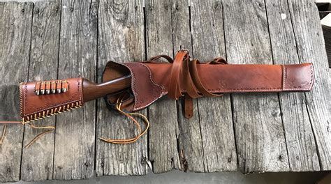 This cowboy put up with many a rough ride in his day, but his beloved rifle had a more delicate constitution. . Leather rifle scabbard for atv